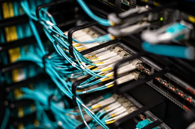 Numerous wires and cables mounted into server patch panel in modern data center. Where enterprise SEO is heading: index policy, governed automation, and reversible change