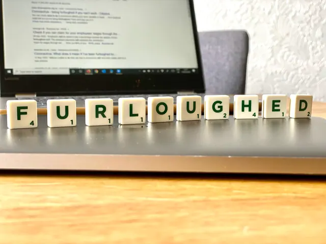 An image showing letter tiles reading "Furloughed." In the background, a search results page on a laptop displays things you can do while on Furlough. Produced for our own blog pos. On-page SEO: a focused business guide for 2027