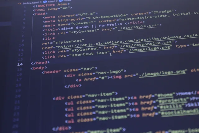 Close-up view of HTML and CSS code displayed on a computer screen, ideal for programming and technology themes. On-page SEO examples with practical lessons for teams