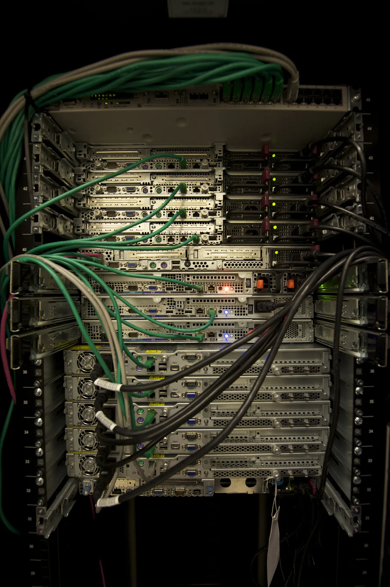 Network and computing equipment mounted in a tall server rack.